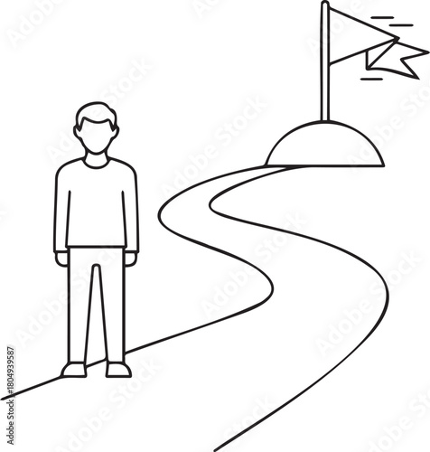 Man standing at the beginning of a winding road to a flag.