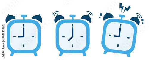 Blue alarm clocks, showing different times and ringing to signal a wake-up call.