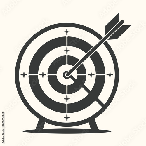 Target with arrow hitting the center bullseye, symbolizing business success and accurate goal achievement