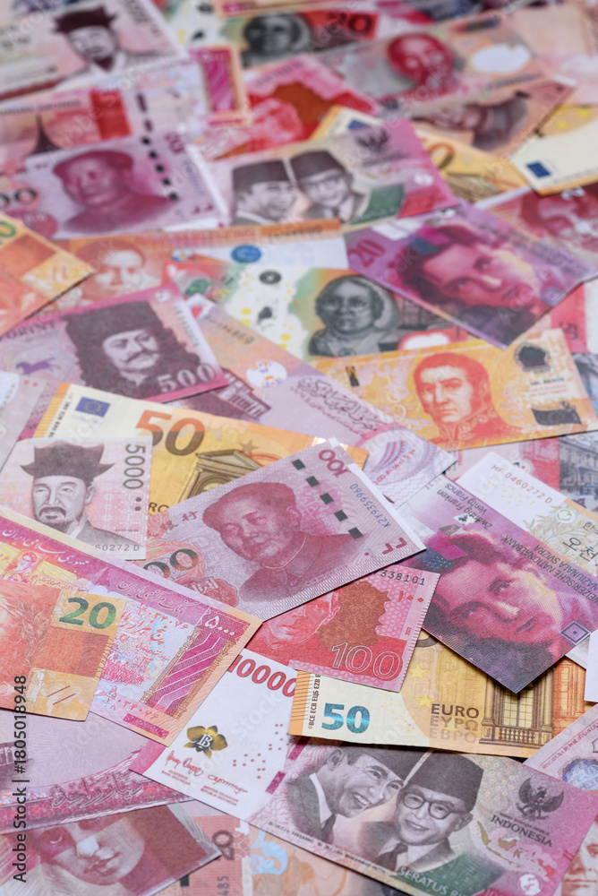 Fototapeta premium Money background, currency exchange, paper banknotes from different countries. Money cash currency