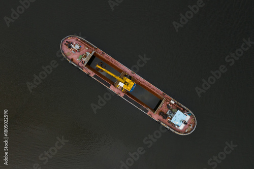 Canvas Print Top view of large ship is floating on the water