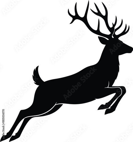 Majestic silhouette of a stag with antlers leaping gracefully against a white background