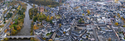 An aerial panorama view above the old town of the city Limburg on an early summer morning in Germany