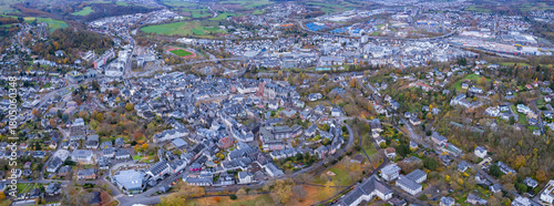 An aerial panorama view above the old town of the city Wetzlar on an early summer morning in Germany