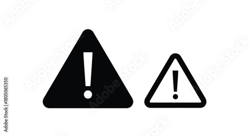 Two black and white triangular warning signs with exclamation points
