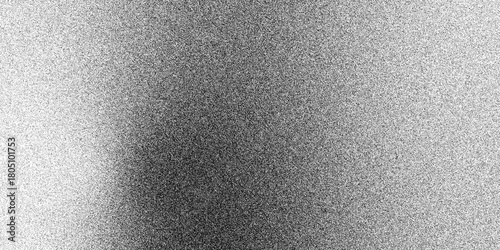 Abstract monochrome halftone texture for background or overlay. Vector black and white halftone texture, transitioning smoothly from dark to light with a dense arrangement of dots. Design concept 