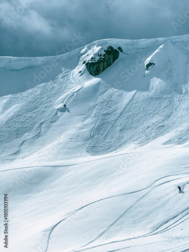 Adventure skiers on fresh powder