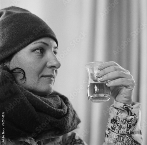 Winter in Batoumi, a woman is having black tea. Georgia - February 2025.