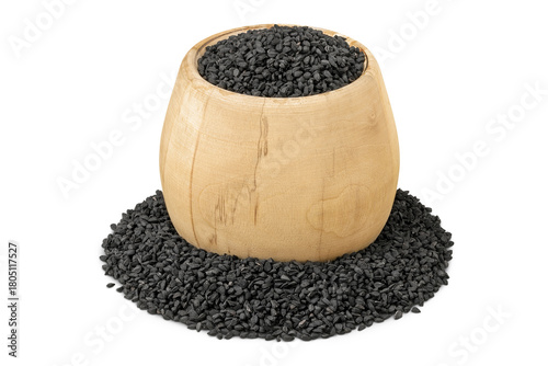 Nigella sativa or Black cumin in wooden bowl isolated on white background