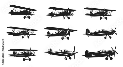 A collection of nine black silhouettes of vintage propeller aircraft, including biplanes and monoplanes, isolated on a white background.
