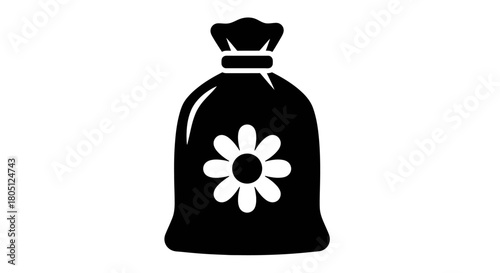 A black silhouette icon of a tied sack or bag decorated with a simple flower design.