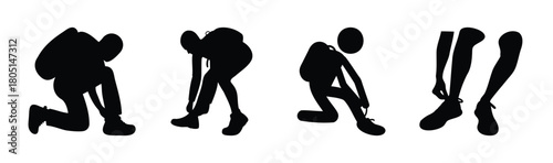 Hiker silhouettes tying shoelaces, preparing for adventure