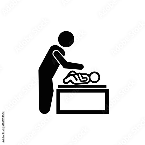 A person changes a baby on a changing table.