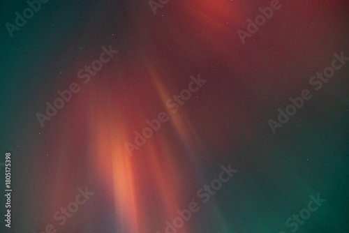 Pink, red and yellow Aurora Borealis in night sky, Wisconsin, United States