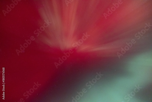Pink, red, and green Aurora Borealis in night sky, Wisconsin, United States