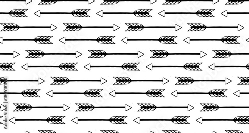 Seamless black and white pattern featuring hand drawn arrows in repeating rows, creating a rustic, minimalist, and playful design ideal for backgrounds and textiles.