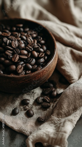 Coffee Beans in a Rustic Bowl on a Natural Fabric Background at a Cozy Kitche...