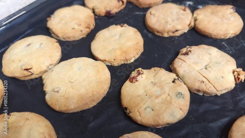 Shortbread cookies on a baking tray, fresh homemade treat.