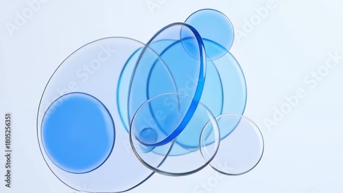 Abstract 3D Render of Multiple Floating Transparent and Translucent Blue Glass Circles and Discs, Symbolizing Liquid, Modern Science Background, and Data Connectivity