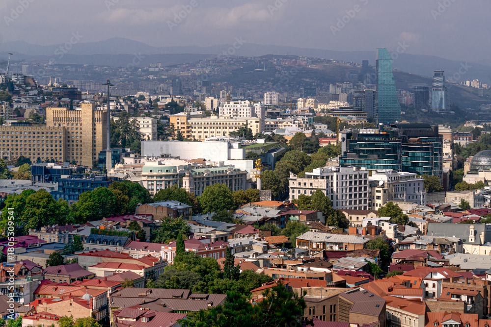 Fototapeta premium Tbilisi's landmarks from above. Traveling around Georgia. View of Tbilisi in autumn, October2025.