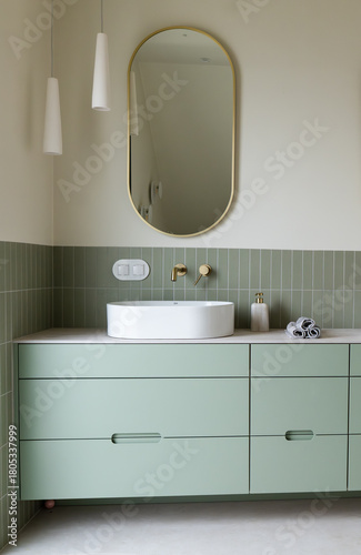 Modern Bathroom Vanity with Gold Mirror and Sage Green Cabinets