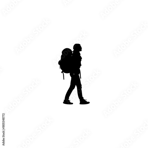 Adventurous hiker silhouette ready to explore the world with backpack and determination in black and white