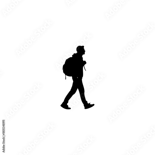 Silhouette of a young man walking with a backpack adventure awaits exploring the world travel