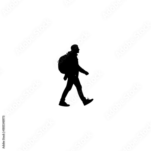 Powerful silhouette of a traveler walking with backpack represents adventure and wanderlust on white
