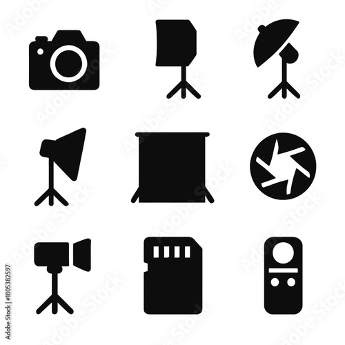 Black photography equipment icon set with camera and lighting elements
