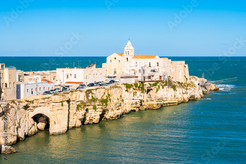 Fototapeta Naklejka Na Ścianę i Meble -  Scenic view of Vieste, a charming seaside town on Italy’s Gargano Peninsula, with sandy beach and whitewashed houses, Apulia, Italy