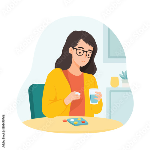 Woman taking medicine with water at a table