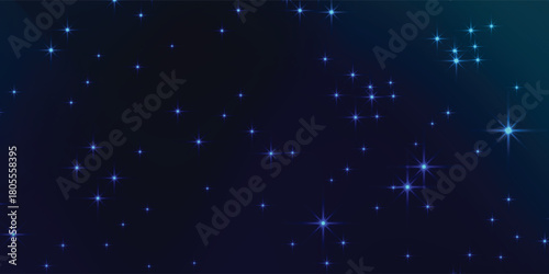 Elegant deep blue background sparkles with a dusting of tiny glowing stars in a celestial arrangement that twinkles in the dark night like a dreamy and magical backdrop