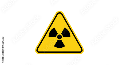 A yellow triangular warning sign with the black international radiation hazard symbol, indicating the presence of radioactive materials or nuclear energy