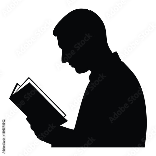 Silhouette of man reading book offers quiet moment for study and contemplation