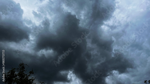 Photography The dark sky with heavy clouds converging and a violent storm before the rain
