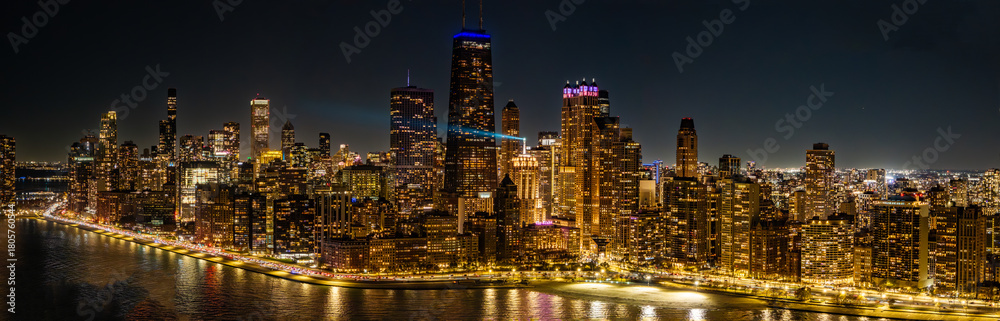 Fototapeta premium Aerial Panoramic of Chicago Skyline at Night – November 15, 2025” Stunning aerial panoramic view of the Chicago skyline at night on November 15, 2025. The city’s iconic skyscrapers, including Willis 