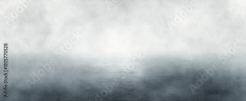 misty minimalist seascape with calm reflective water and soft overcast sky conveying serene solitude