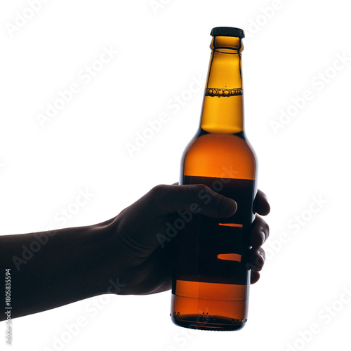 Hand holding amber beer bottle with label against dark backdrop studio shot isolated on transparent background