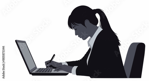 Woman in business attire diligently working on a laptop computer.