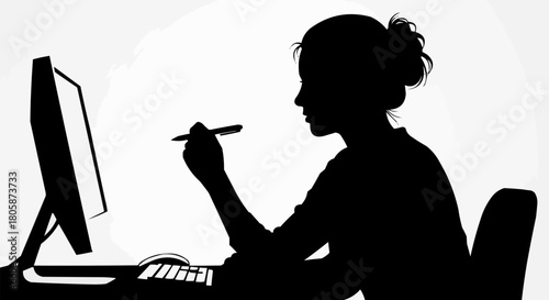 Silhouette of a woman working on a computer with a stylus.