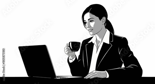 Professional businesswoman in a suit working on a laptop while drinking coffee.