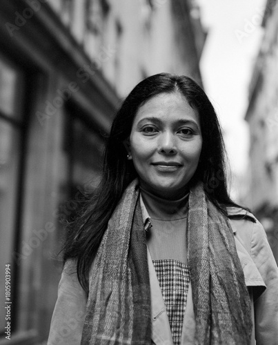 Smiling woman posing for individual street portrait