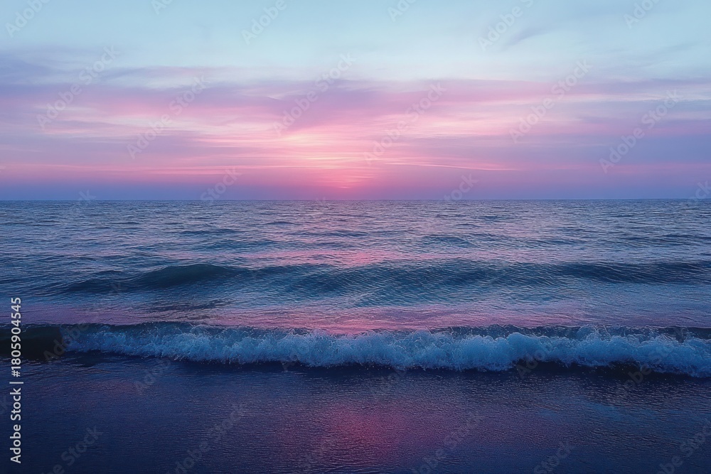 Fototapeta premium calm ocean waves lapping a shoreline under a pastel pink and purple sunset sky, serene and dreamy mood