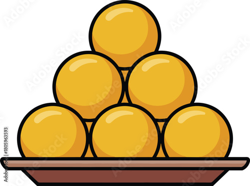 Stacked yellow round candies on a brown platter candy