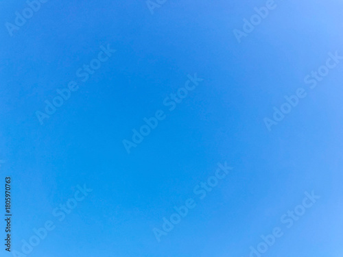 Vivid Deep Blue Sky Smooth Gradient Clean Background with Copy Space on West Lake in Hanoi, Vietnam