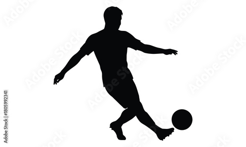 Soccer player kicking ball silhouette