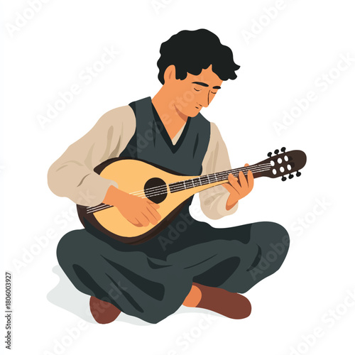 Man playing mandolin sitting cross legged