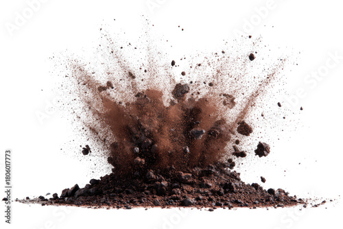 A cloud of dark soil, gravel, and dust expands outward from a center, in explosive detail