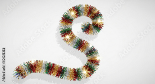 Festive christmas garland in the shape of a snake isolated on