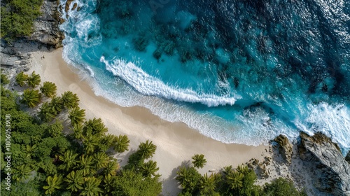Fototapeta Naklejka Na Ścianę i Meble -  Aerial view of secluded sandy beach with turquoise ocean waves and peaceful coastline idyllic tropical summer travel and vacation background
